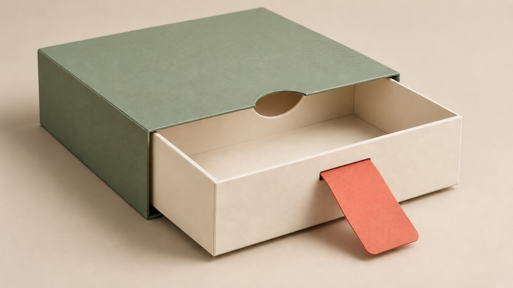 Partly opened drawer gift box with a broad paper pull and a finger cutout.